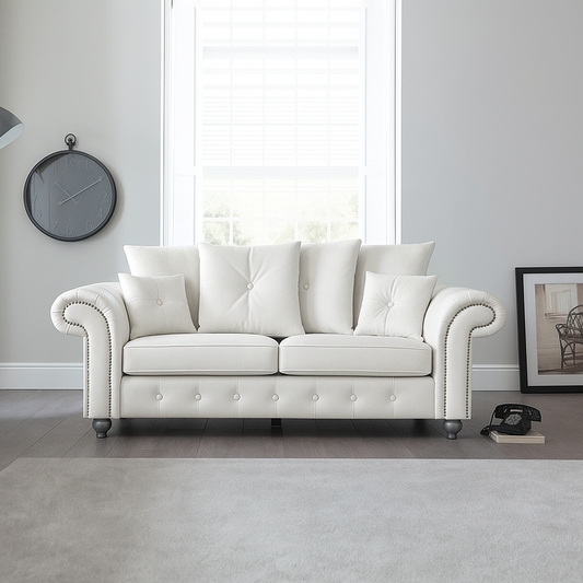 Elegant Leather Ashwin 3-Seater Sofa in Cream — Modern Chesterfield design with button detailing and plush cushions in a bright living room